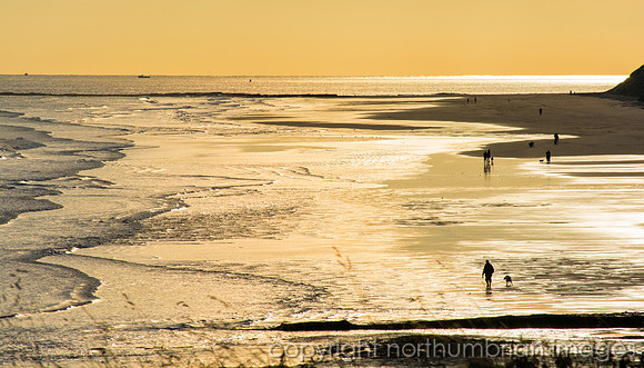 Bamburgh beach silhouettes
